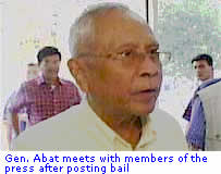 Gen Abat meets with members of the press after positng bail