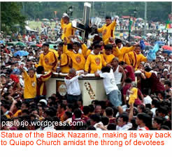 Statue of the Black Nazarine, making its way back to Quiapo Church amidst the throng of devotees