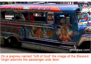 On a jeepney named "Gift of God" the image of the Blessed Virgin adornes the passenger-side door