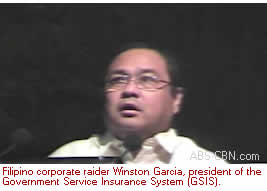 Beleaguered Meralco President and COO Jesus Francisco (left) and chairman and CEO Manuel Lopez during the contentious May, 2008 Stockholder's meeting.