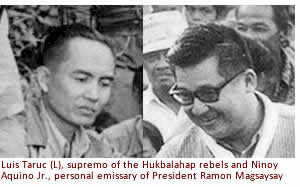 Luis Taruc (L), supremo of the Hukbalahap rebels and Ninoy Aquino Jr., personal emissary of President Ramon Magsaysay