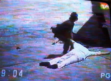 Ninoy Aquino's lifeless body lying on the airport tarmac. Photo: wikipedia.org