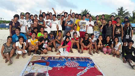 Members of the youth group Kalayaan Atin Ito pose for a Facebook photo on Pag-asa island