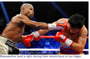 Mayweather land a right during their recent bout in Las Vegas