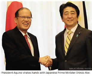 President Aquino shakes hands with Japanese Prime Minister Shinzo Abe